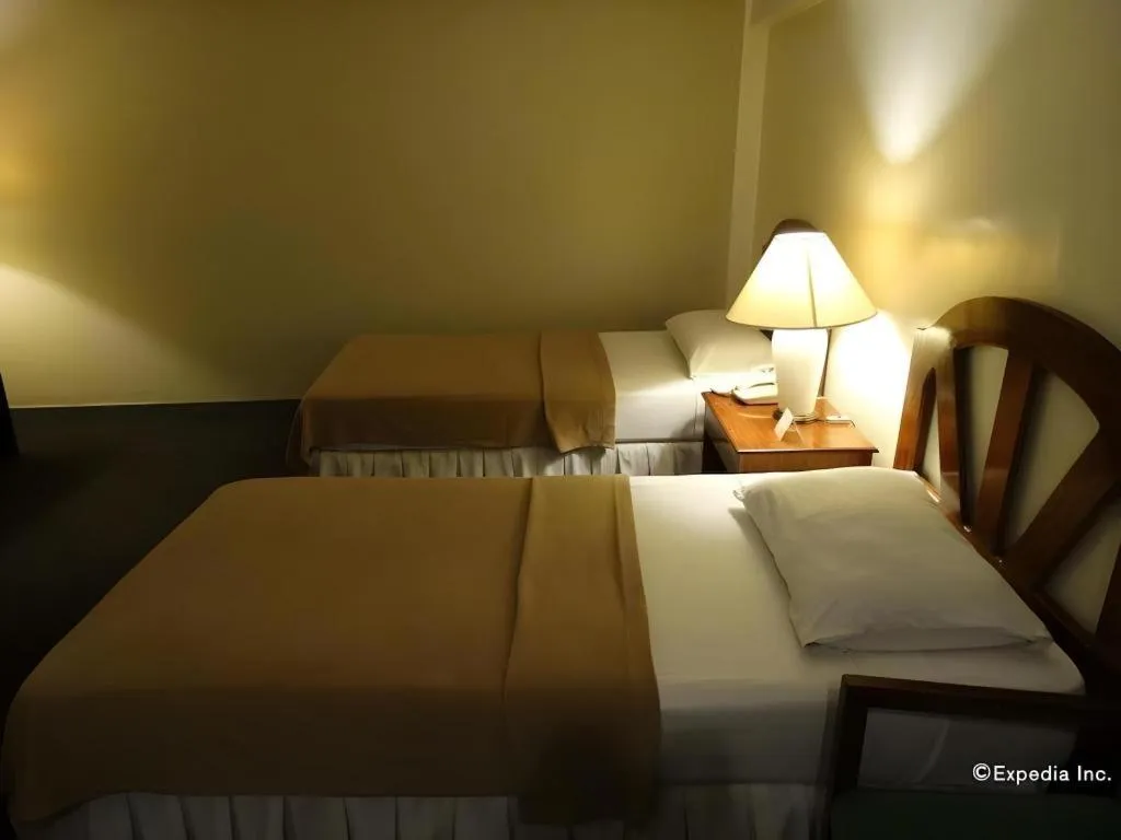 Bed in Adriatico Arms Hotel