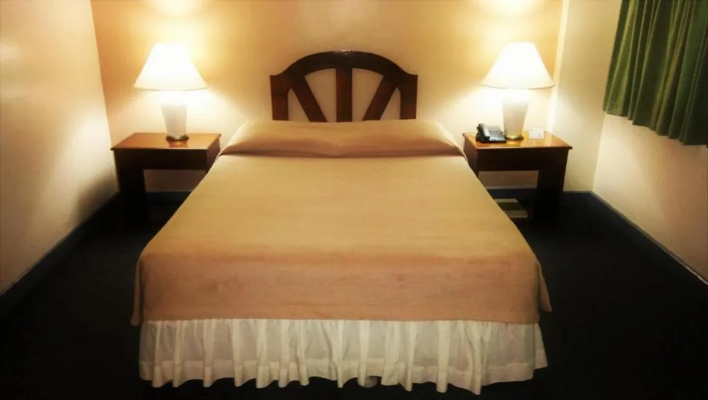 Bed in Adriatico Arms Hotel