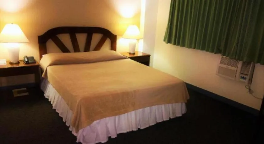 Bed in Adriatico Arms Hotel