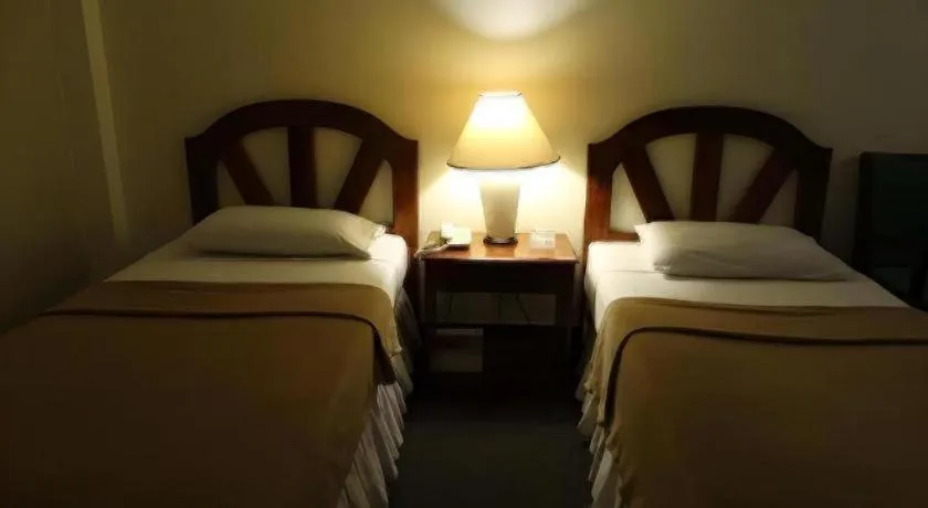 Bed in Adriatico Arms Hotel