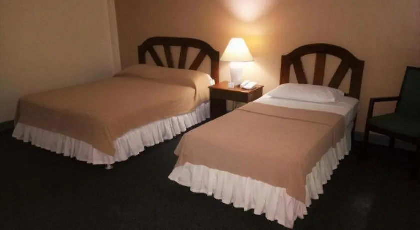 Bed in Adriatico Arms Hotel
