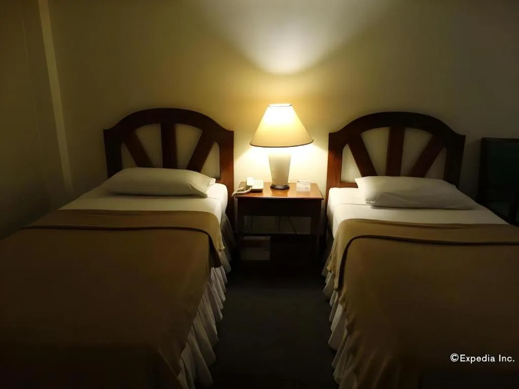 Bed in Adriatico Arms Hotel