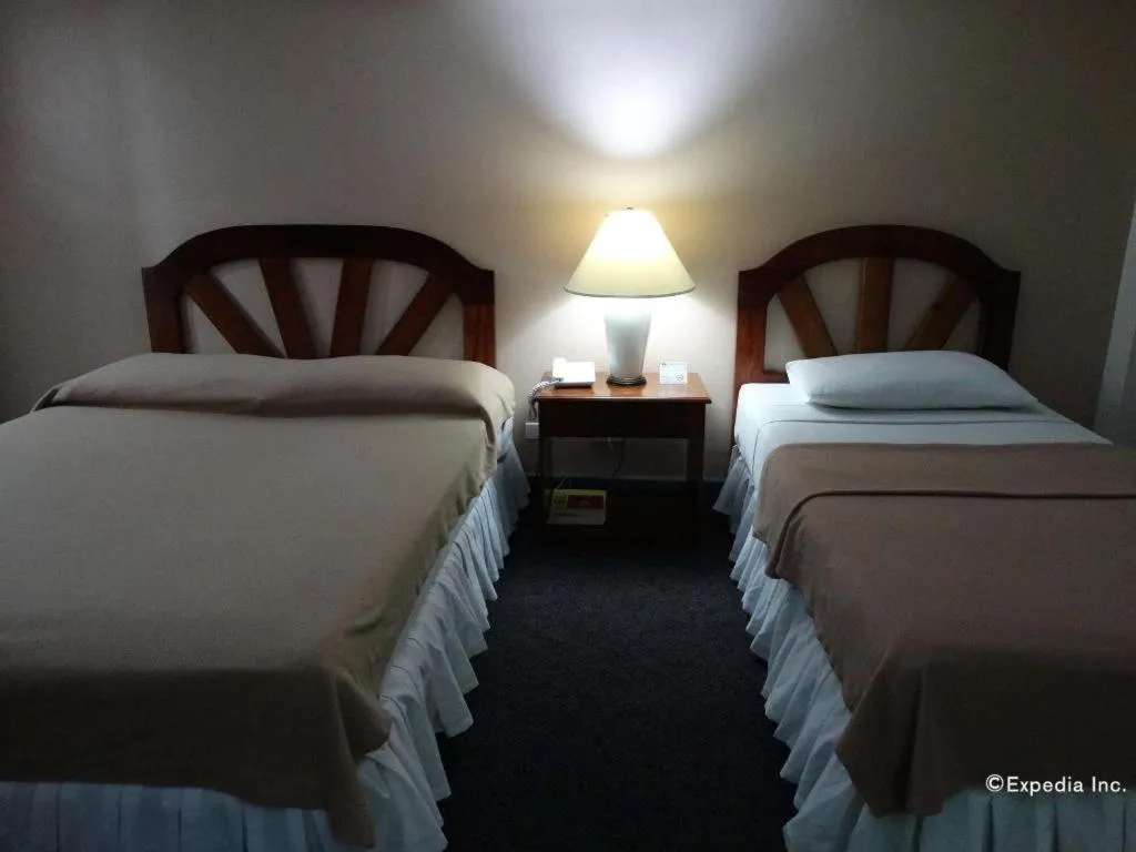 Bed in Adriatico Arms Hotel