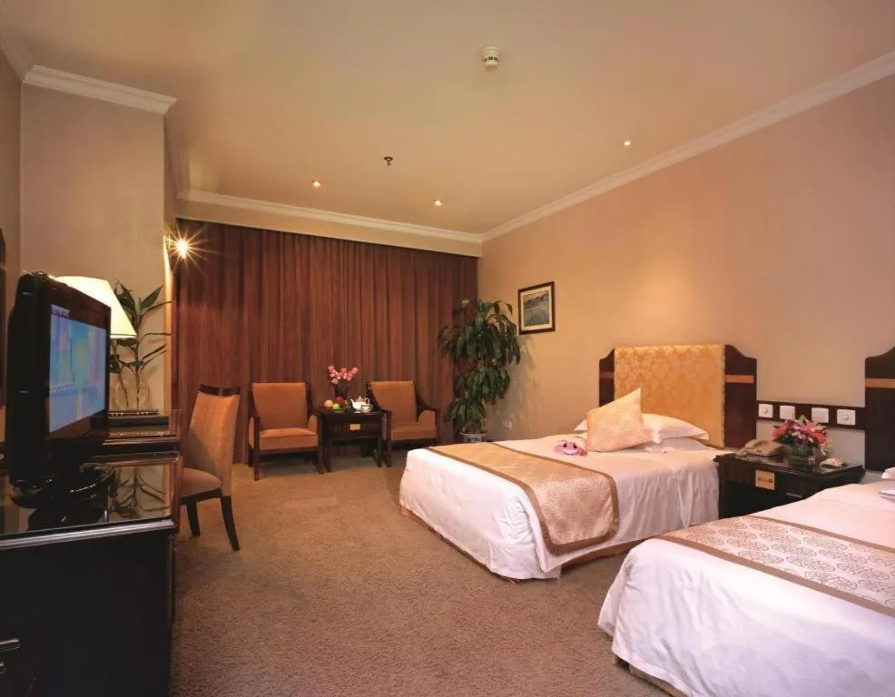 Bed in Chongqing Sunshine Continental Grand Hotel