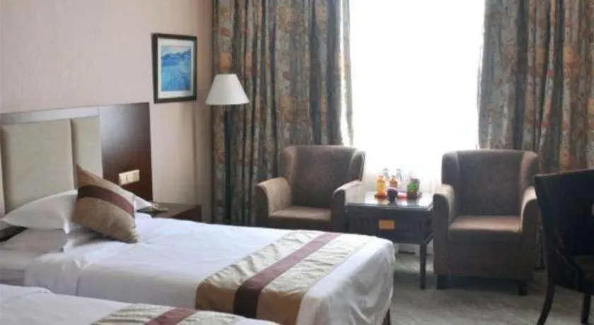 Bed in Chongqing Sunshine Continental Grand Hotel