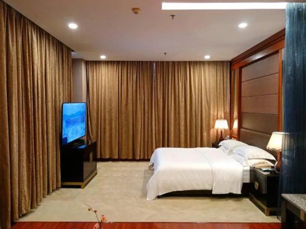 Bed in OSOTTO RECREATION HOTEL