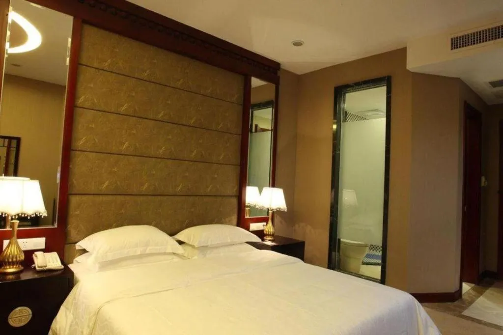 Bed in OSOTTO RECREATION HOTEL