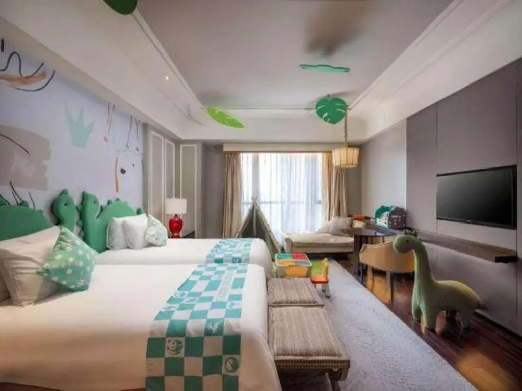 Bed in Grand New Century Hotel Yixing
