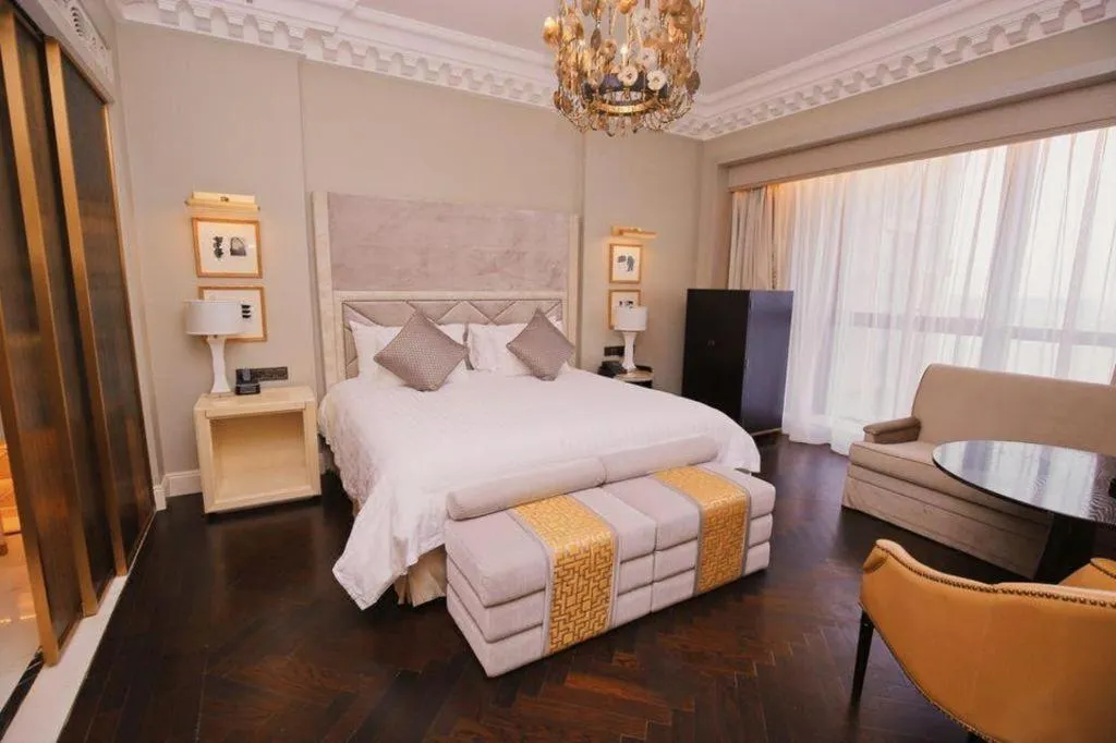 Bed in Grand New Century Hotel Yixing