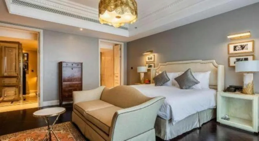 Bed in Grand New Century Hotel Yixing