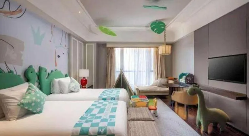 Bed in Grand New Century Hotel Yixing
