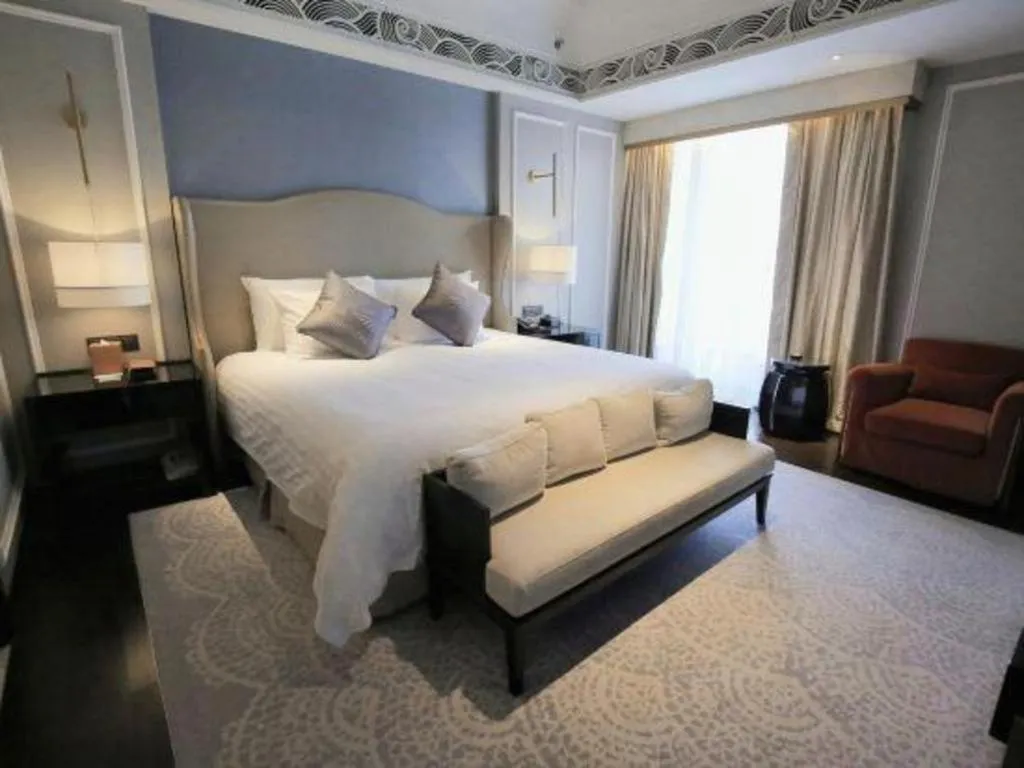 Bed in Grand New Century Hotel Yixing