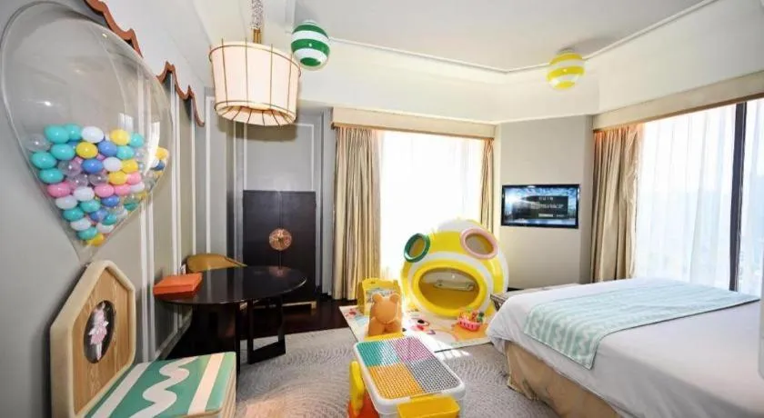 Bed in Grand New Century Hotel Yixing