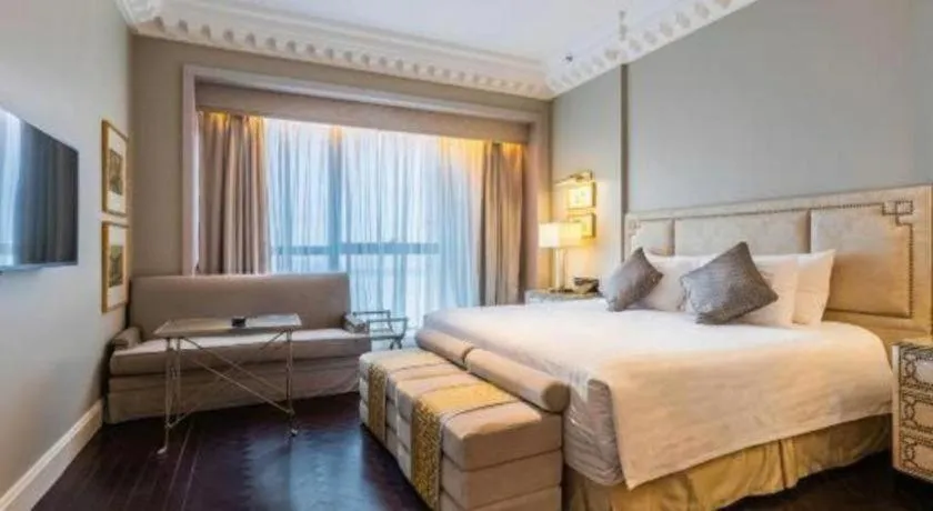 Bed in Grand New Century Hotel Yixing