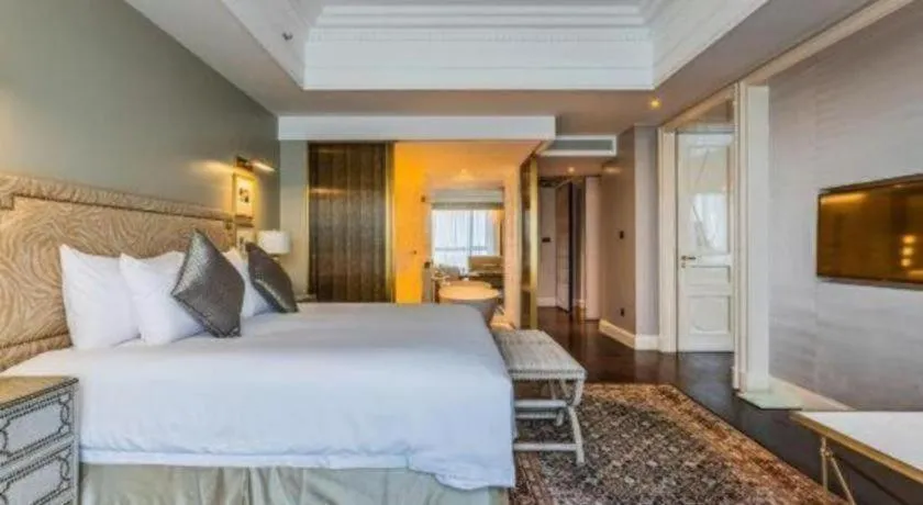 Bed in Grand New Century Hotel Yixing
