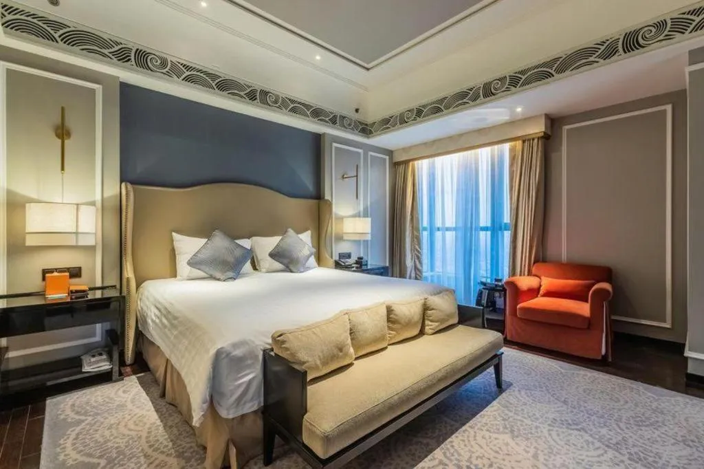 Bed in Grand New Century Hotel Yixing