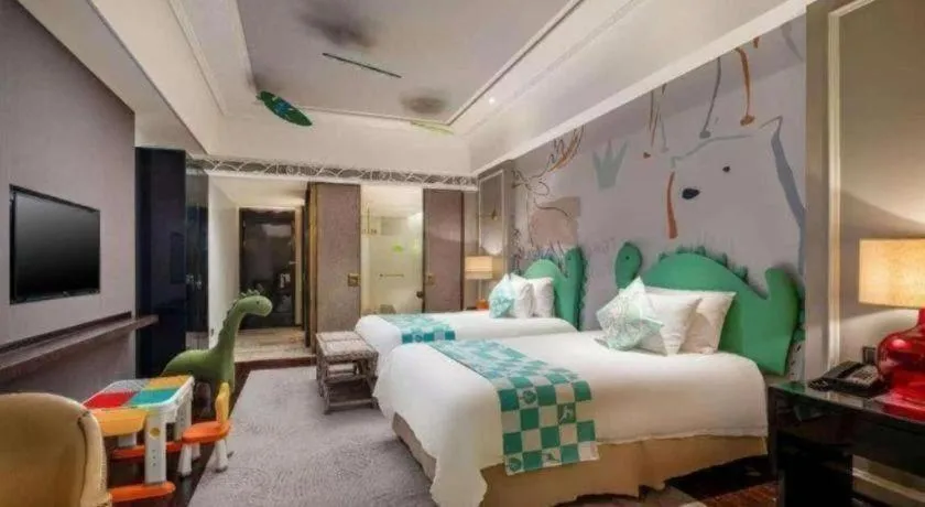 Bed in Grand New Century Hotel Yixing