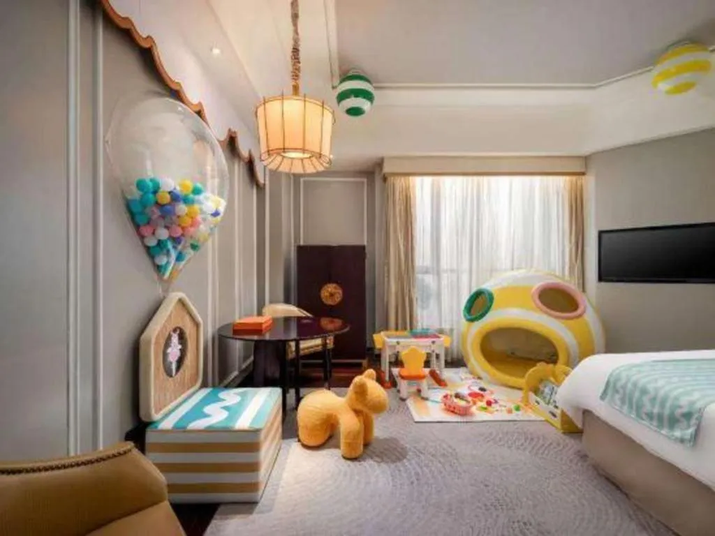 Bed in Grand New Century Hotel Yixing