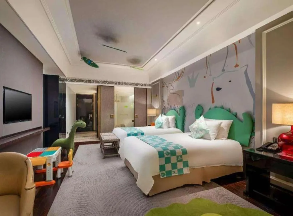 Bed in Grand New Century Hotel Yixing