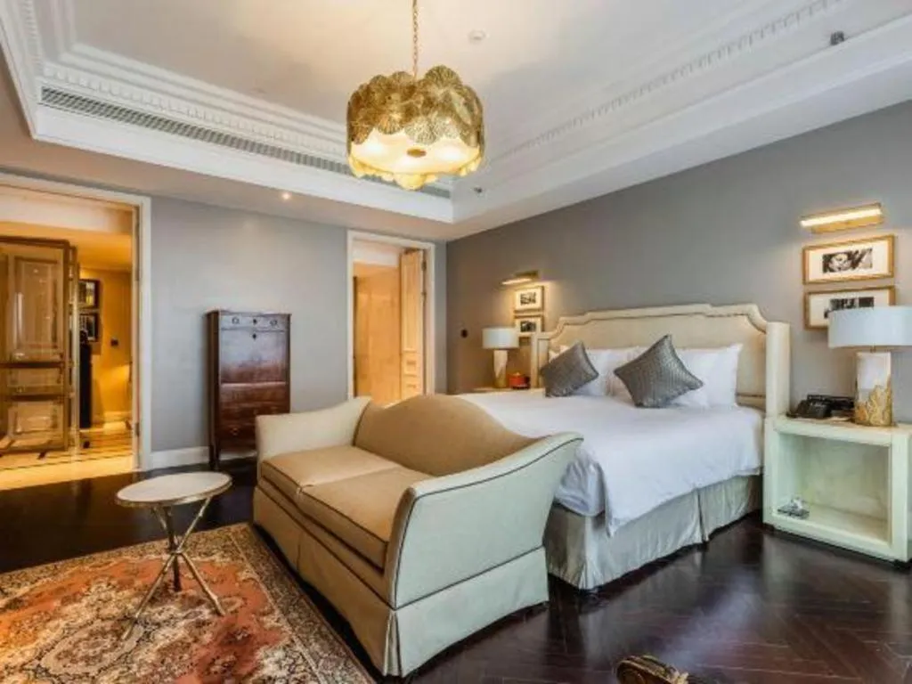 Bed in Grand New Century Hotel Yixing
