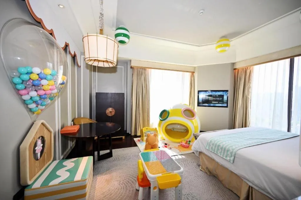 Bed in Grand New Century Hotel Yixing