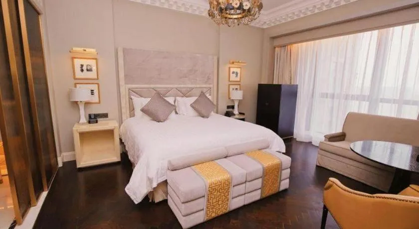 Bed in Grand New Century Hotel Yixing