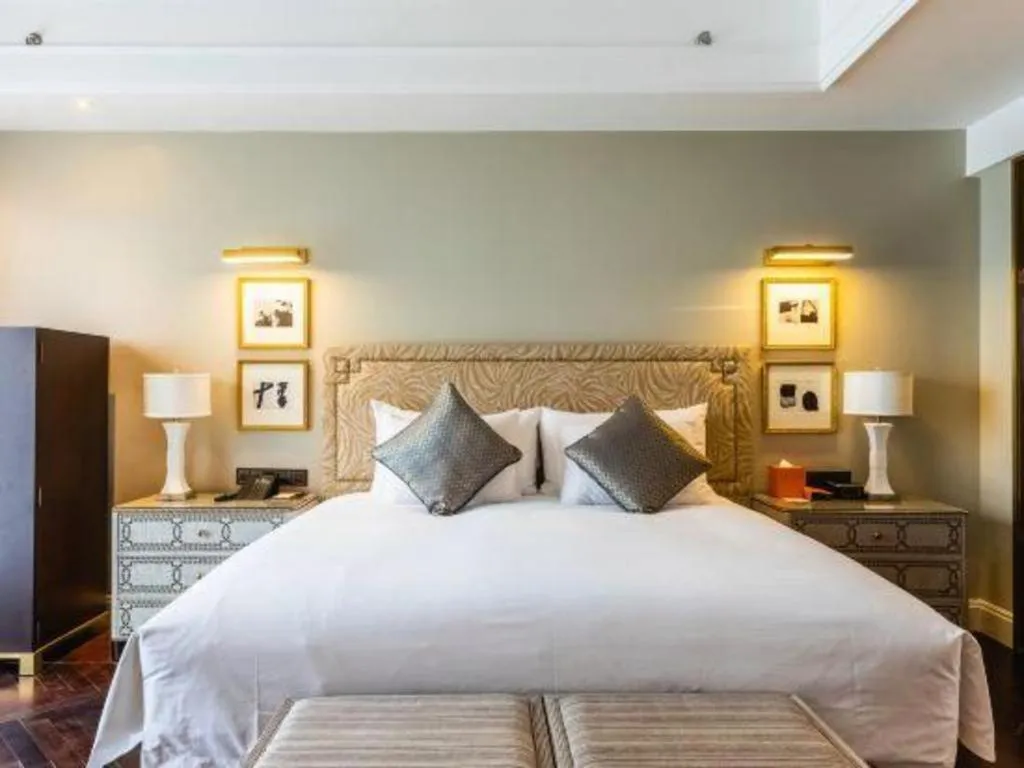 Bed in Grand New Century Hotel Yixing