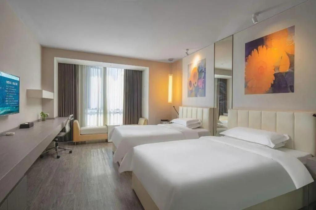 Bed in Jinjiang Metropolo Hotel Hangzhou Xiasha Jinsha Lake