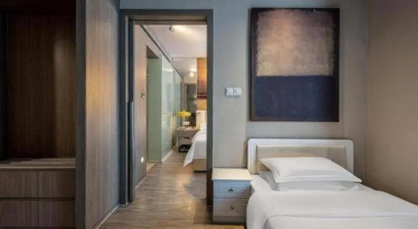 Bed in Jinjiang Metropolo Hotel Hangzhou Xiasha Jinsha Lake