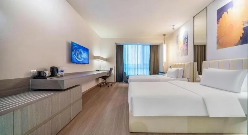 Bed in Jinjiang Metropolo Hotel Hangzhou Xiasha Jinsha Lake