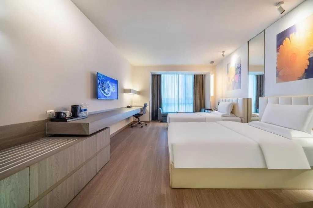 Bed in Jinjiang Metropolo Hotel Hangzhou Xiasha Jinsha Lake