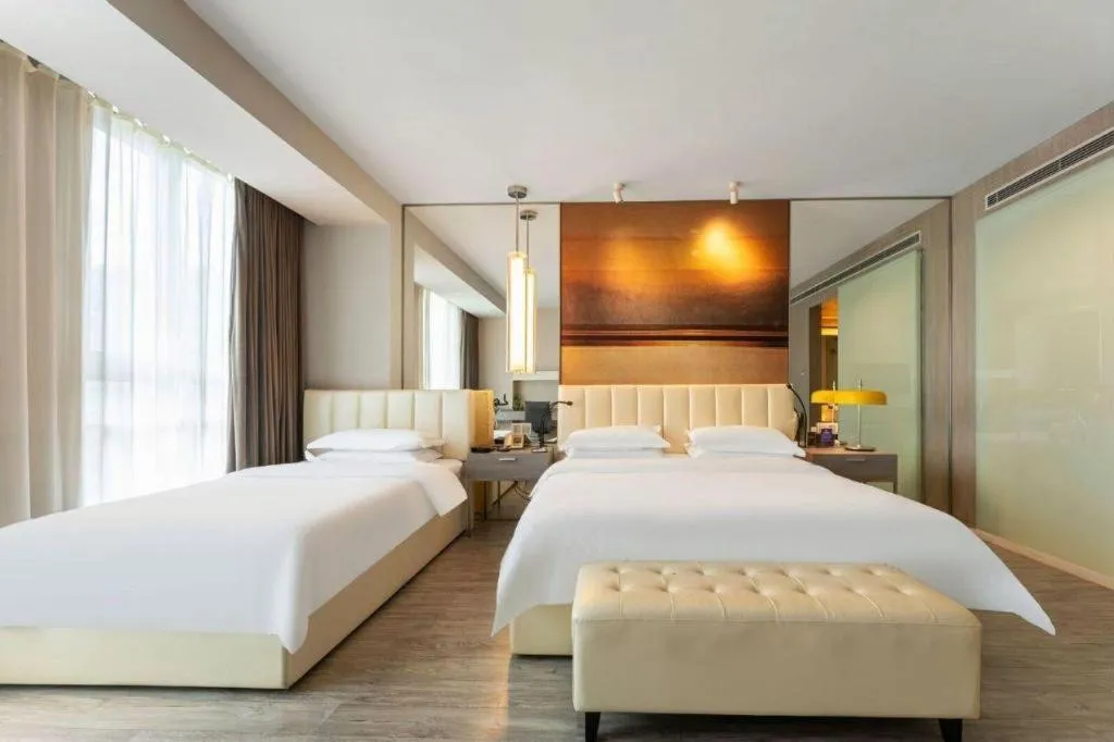 Bed in Jinjiang Metropolo Hotel Hangzhou Xiasha Jinsha Lake