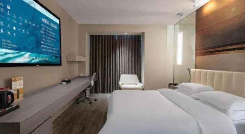 Bed in Jinjiang Metropolo Hotel Hangzhou Xiasha Jinsha Lake