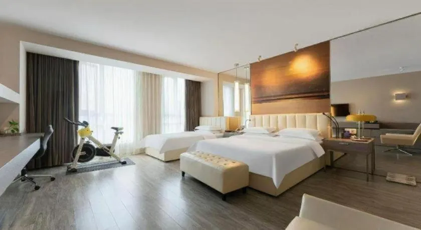 Bed in Jinjiang Metropolo Hotel Hangzhou Xiasha Jinsha Lake