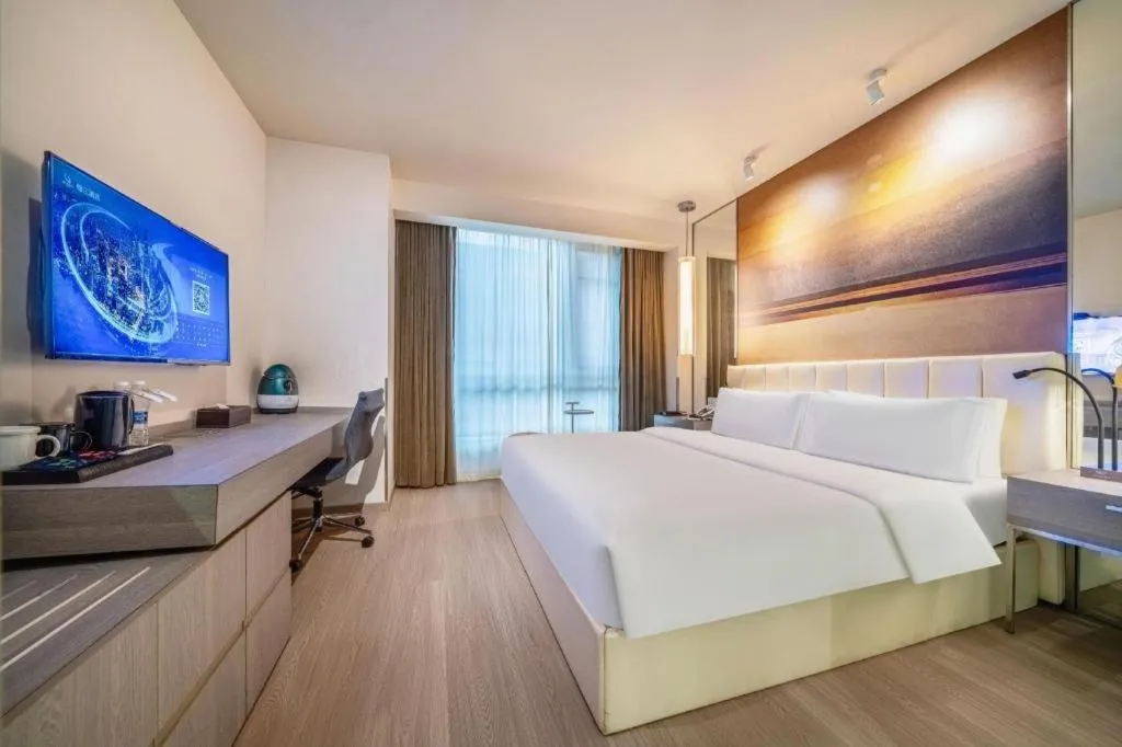 Bed in Jinjiang Metropolo Hotel Hangzhou Xiasha Jinsha Lake