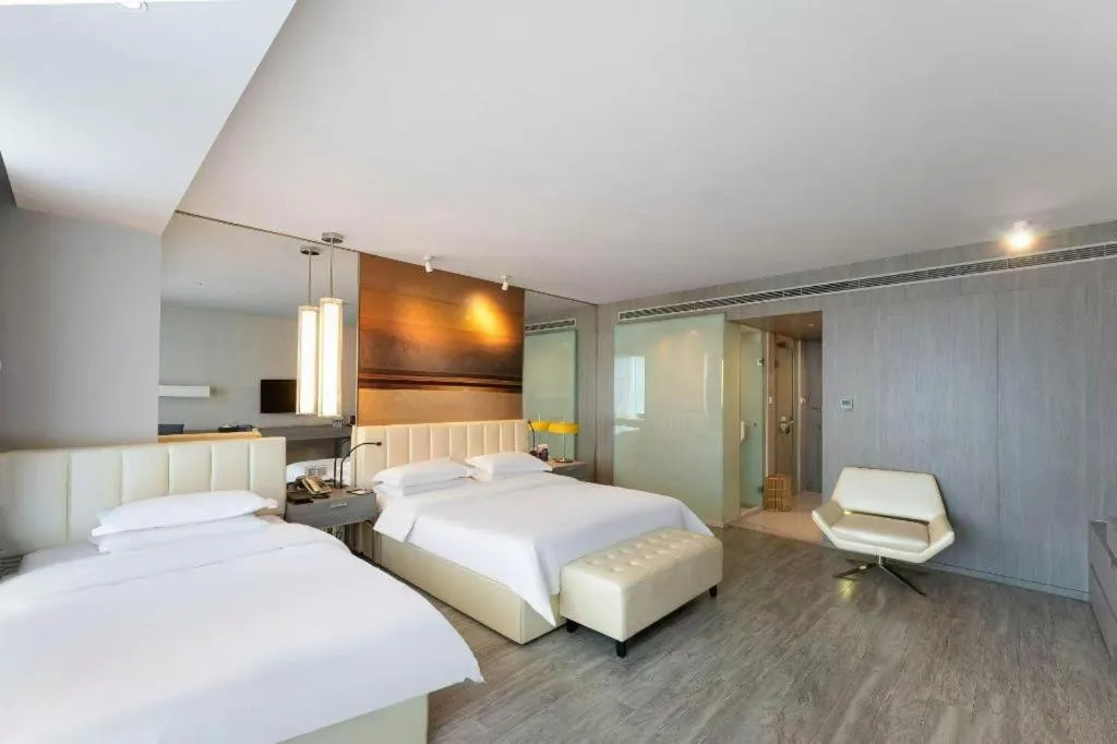 Bed in Jinjiang Metropolo Hotel Hangzhou Xiasha Jinsha Lake