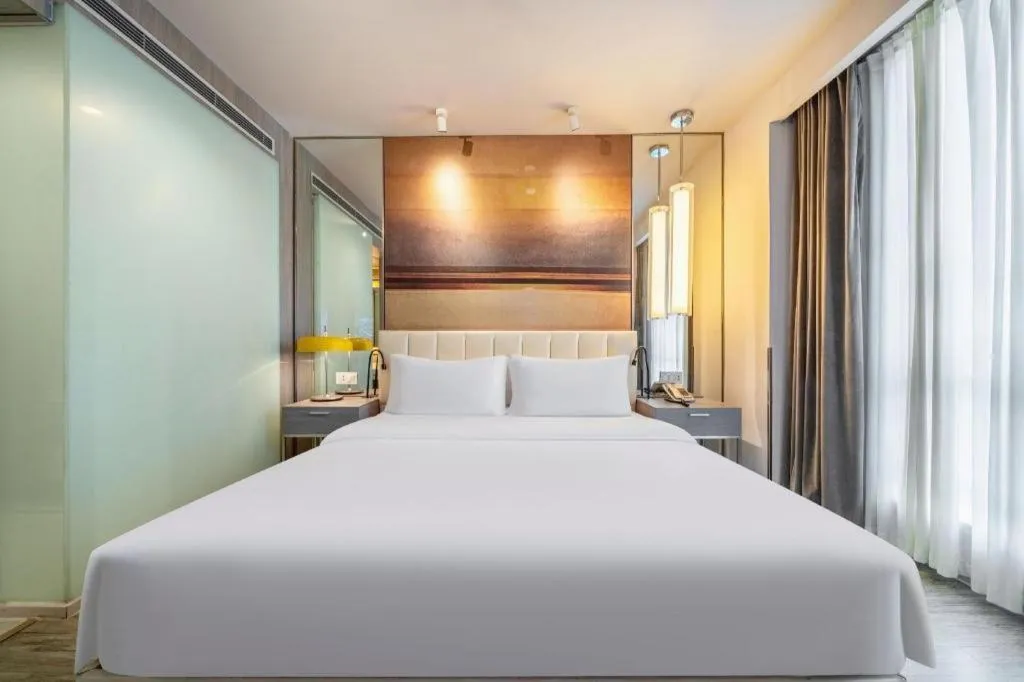 Bed in Jinjiang Metropolo Hotel Hangzhou Xiasha Jinsha Lake