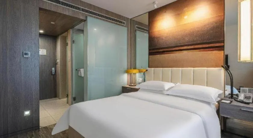 Bed in Jinjiang Metropolo Hotel Hangzhou Xiasha Jinsha Lake