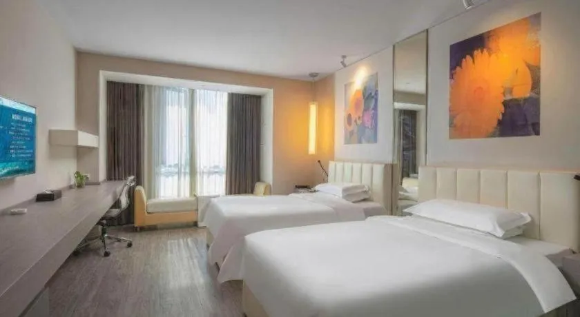 Bed in Jinjiang Metropolo Hotel Hangzhou Xiasha Jinsha Lake