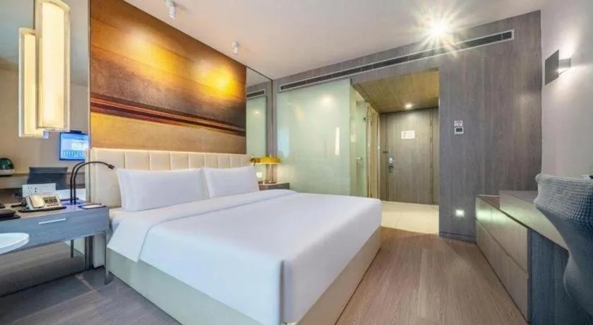 Bed in Jinjiang Metropolo Hotel Hangzhou Xiasha Jinsha Lake