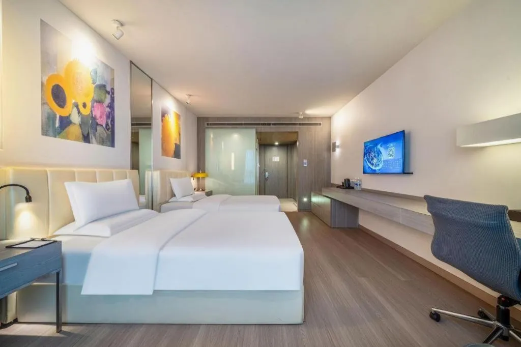 Bed in Jinjiang Metropolo Hotel Hangzhou Xiasha Jinsha Lake