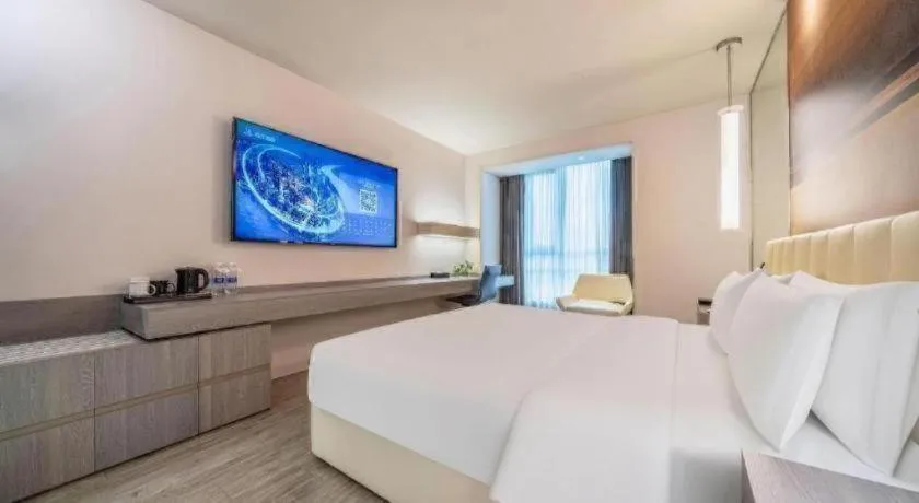 Bed in Jinjiang Metropolo Hotel Hangzhou Xiasha Jinsha Lake