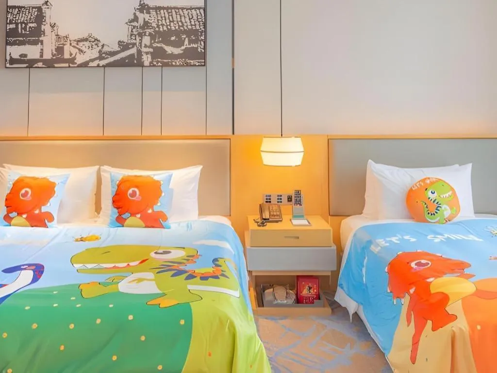 Bed in Zhuhai Tangyi Hotel