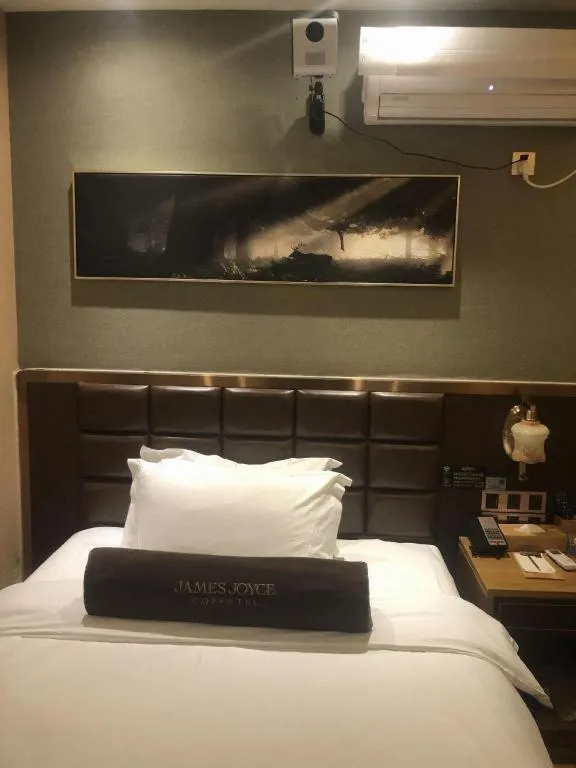 Bed in James Joyce Coffetel·Kaifeng Drum Tower