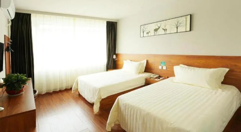 Bed in Jinjiang Inn Style Tianjin Wuqing Traditional Chinese Medical Hospital