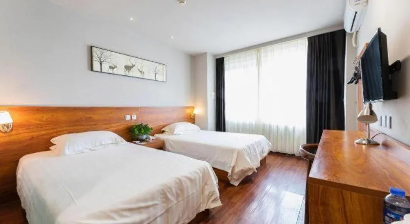 Bed in Jinjiang Inn Style Tianjin Wuqing Traditional Chinese Medical Hospital