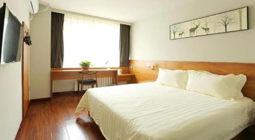 Bed in Jinjiang Inn Style Tianjin Wuqing Traditional Chinese Medical Hospital