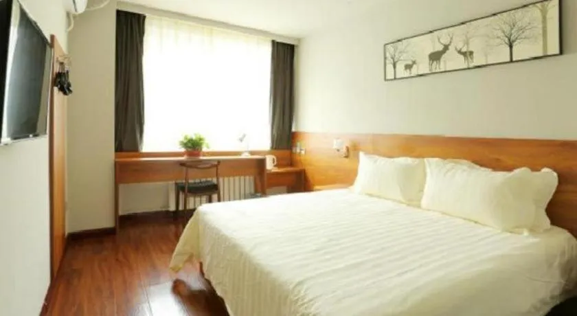 Bed in Jinjiang Inn Style Tianjin Wuqing Traditional Chinese Medical Hospital