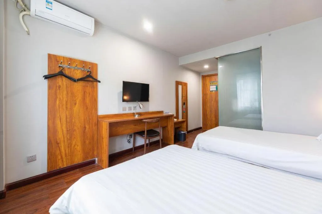 Bed in Jinjiang Inn Style Tianjin Wuqing Traditional Chinese Medical Hospital