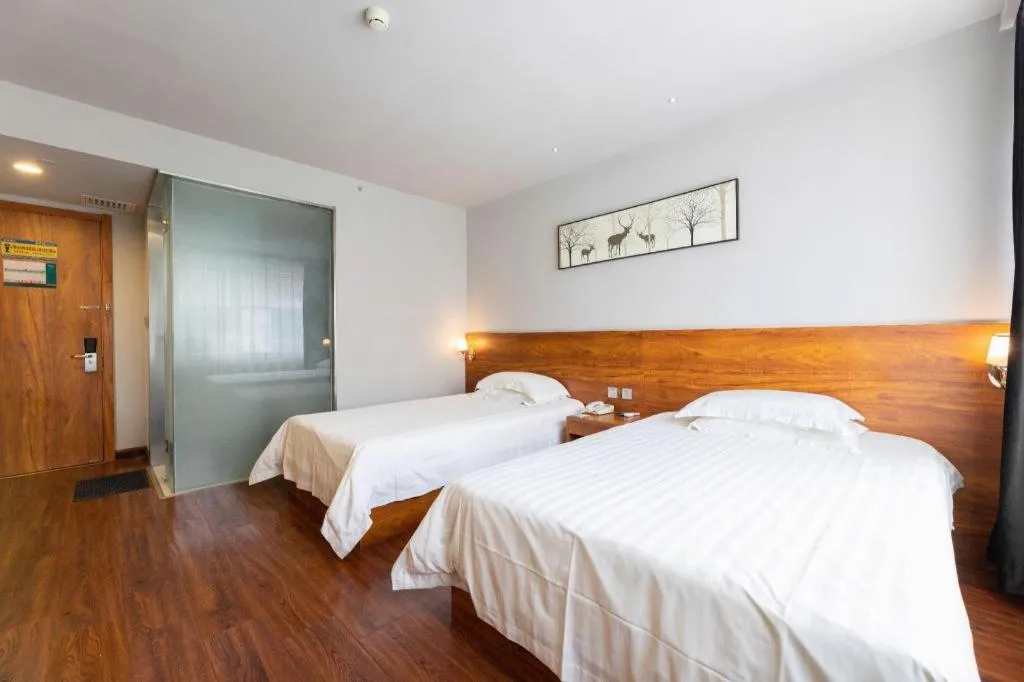 Bed in Jinjiang Inn Style Tianjin Wuqing Traditional Chinese Medical Hospital